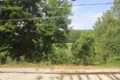 17.06.2014 - Maçanet-Massanes: hlavní trať Portbou - Barcelona v průhledu mezi stromy (foto z vlaku) © PhDr. Zbyněk Zlinský
