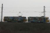 Dvojica pomaľovaných vozňov na súprave do železiarní, 28.2. 2014, © Ing. Igor Molnár