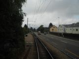 Začátek předposledního jednokolejného úseku tramvajové tratě do Dornachu u zastávky Arlesheim Stollenrain, 24.6.2014 © Jan Přikryl
