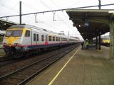 Trojice elektrických jednotek řady AM80 SNCB/NMBS stojí ve stanici Kortrijk před odjezdem vlaku IC do Oostende	9.10.2013	. © 	Jan Přikryl